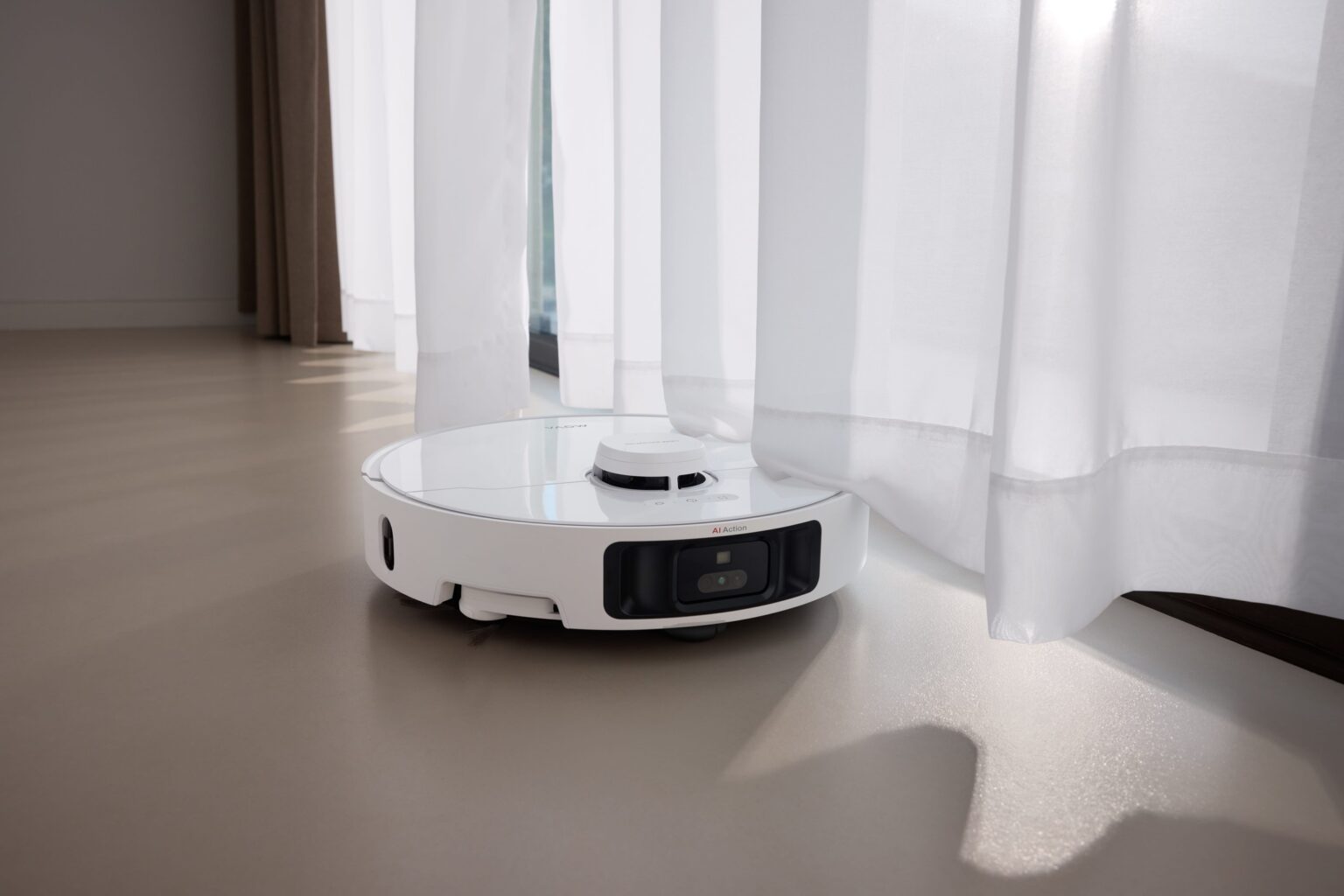 robot sprzątający MOVA, odkurzacz pod oknem