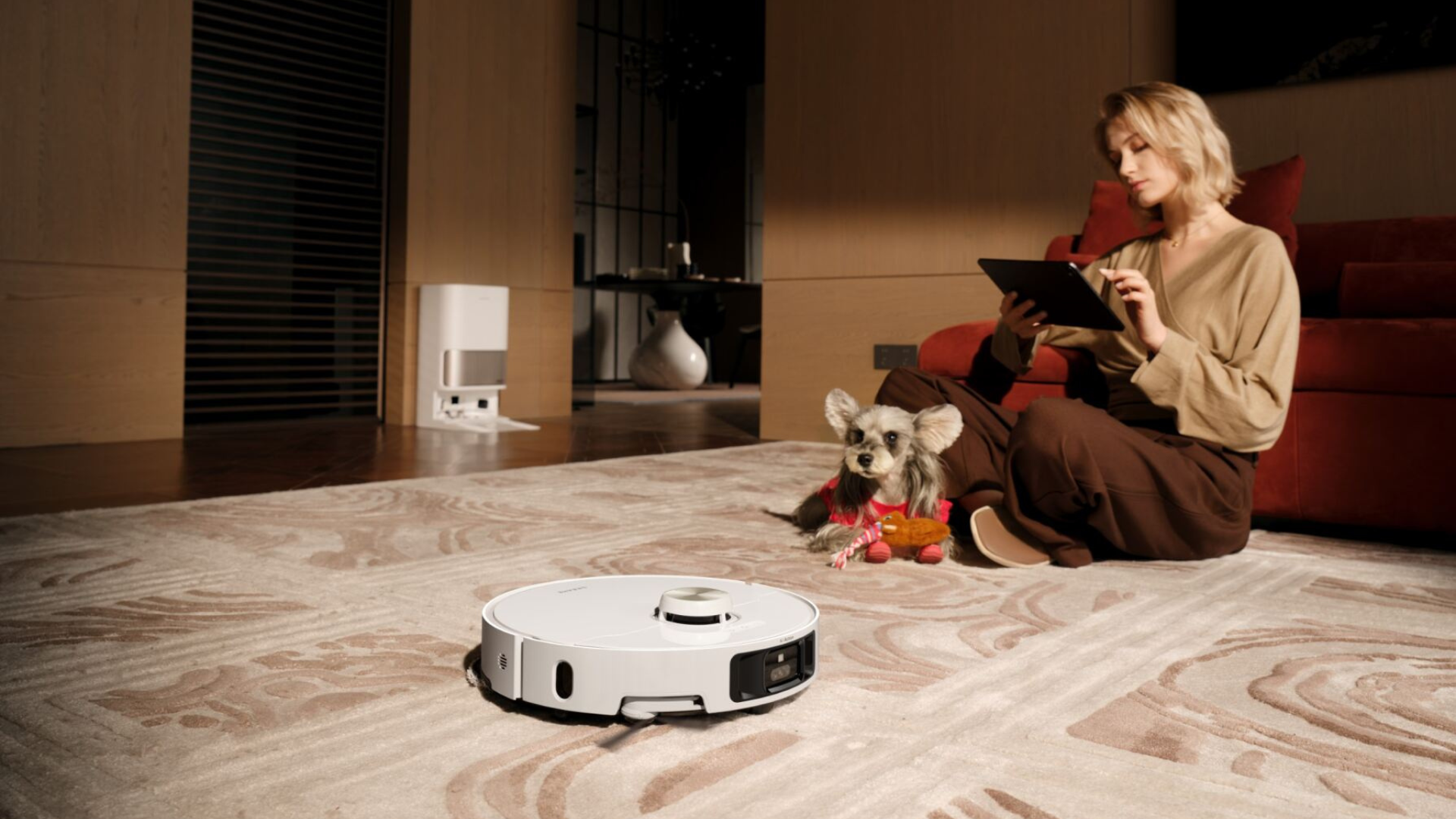 Dreame L40s Pro Ultra na dywanie z psem