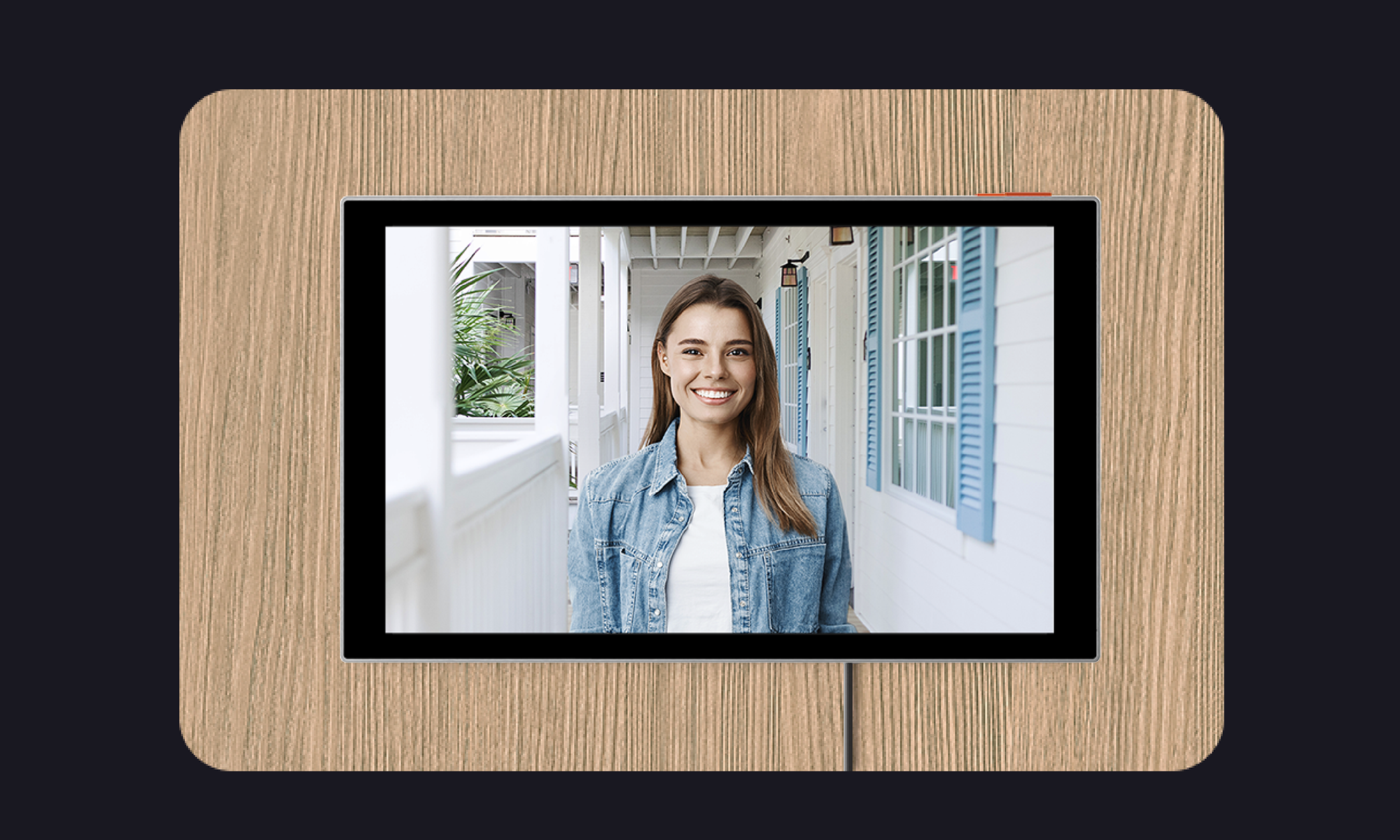 Ten zamek otworzysz przykładając telefon! Ezviz T9 Pro debiutuje Kobieta w ekranie wideodomofonu Ezviz T9 Pro.